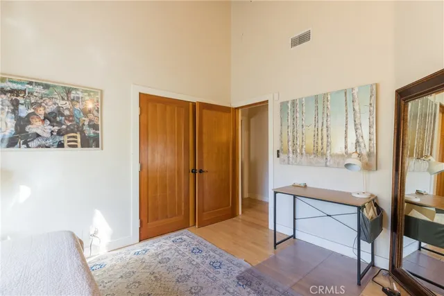 an aerial view of a house with a yard and garden