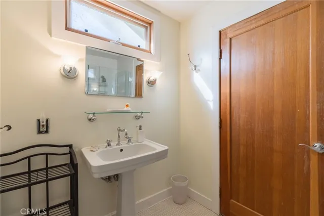 an aerial view of a residential houses with outdoor space