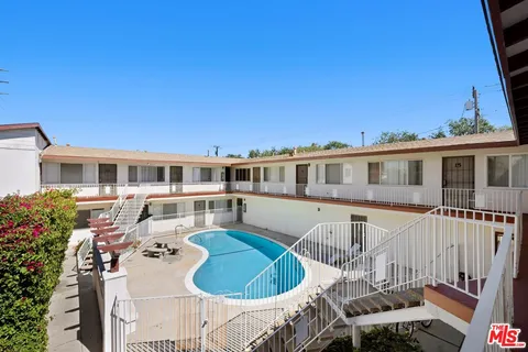a front view of a house with a patio