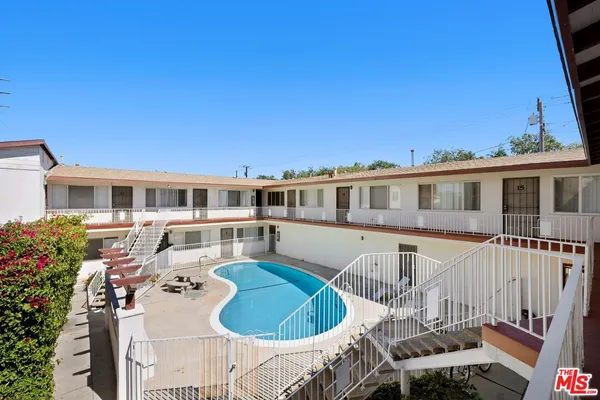a front view of a house with a patio
