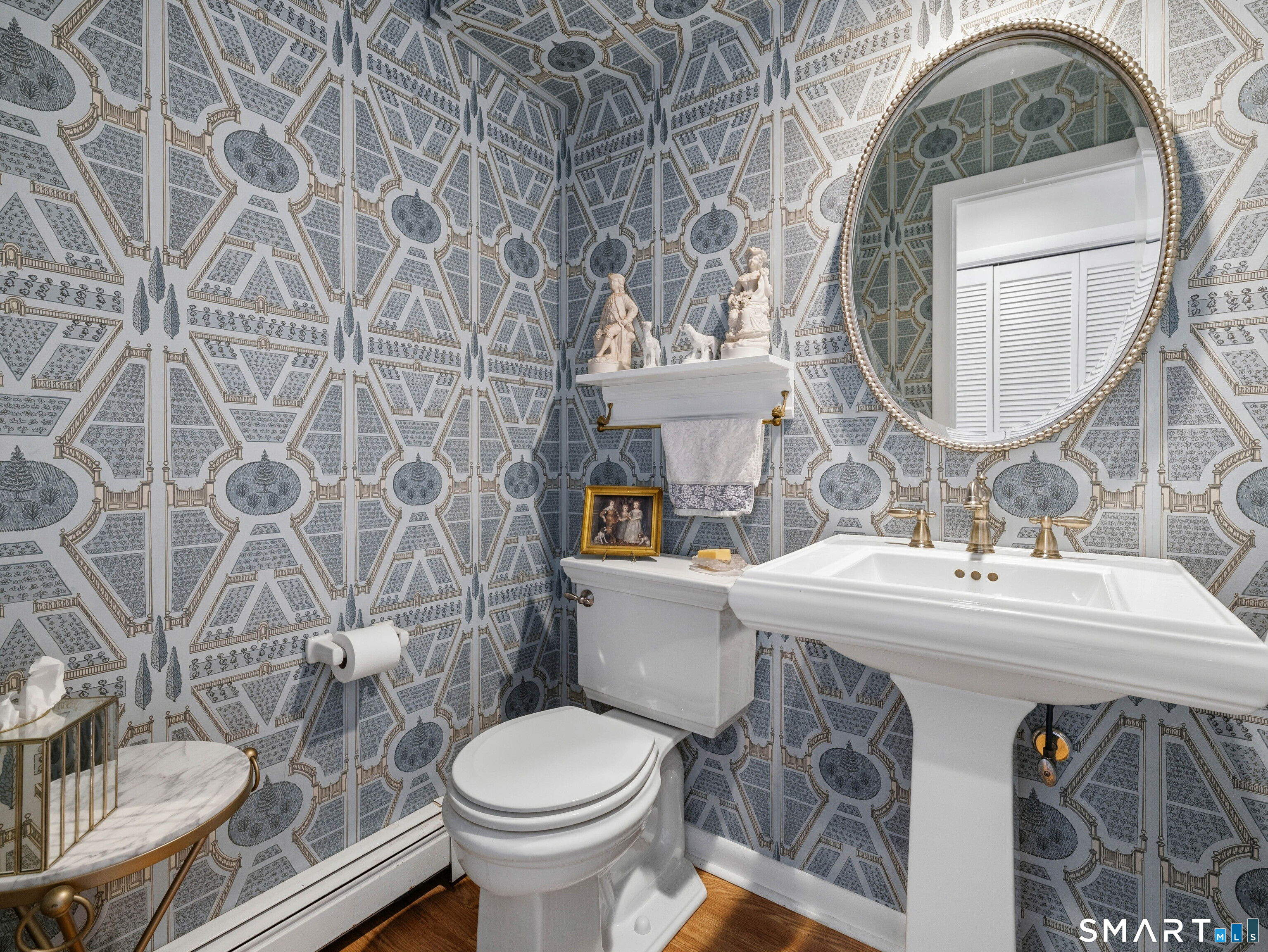 24 Cherry Lane Madison, CT 06443 - Photo 19 of 40 Half bathroom off the dining room