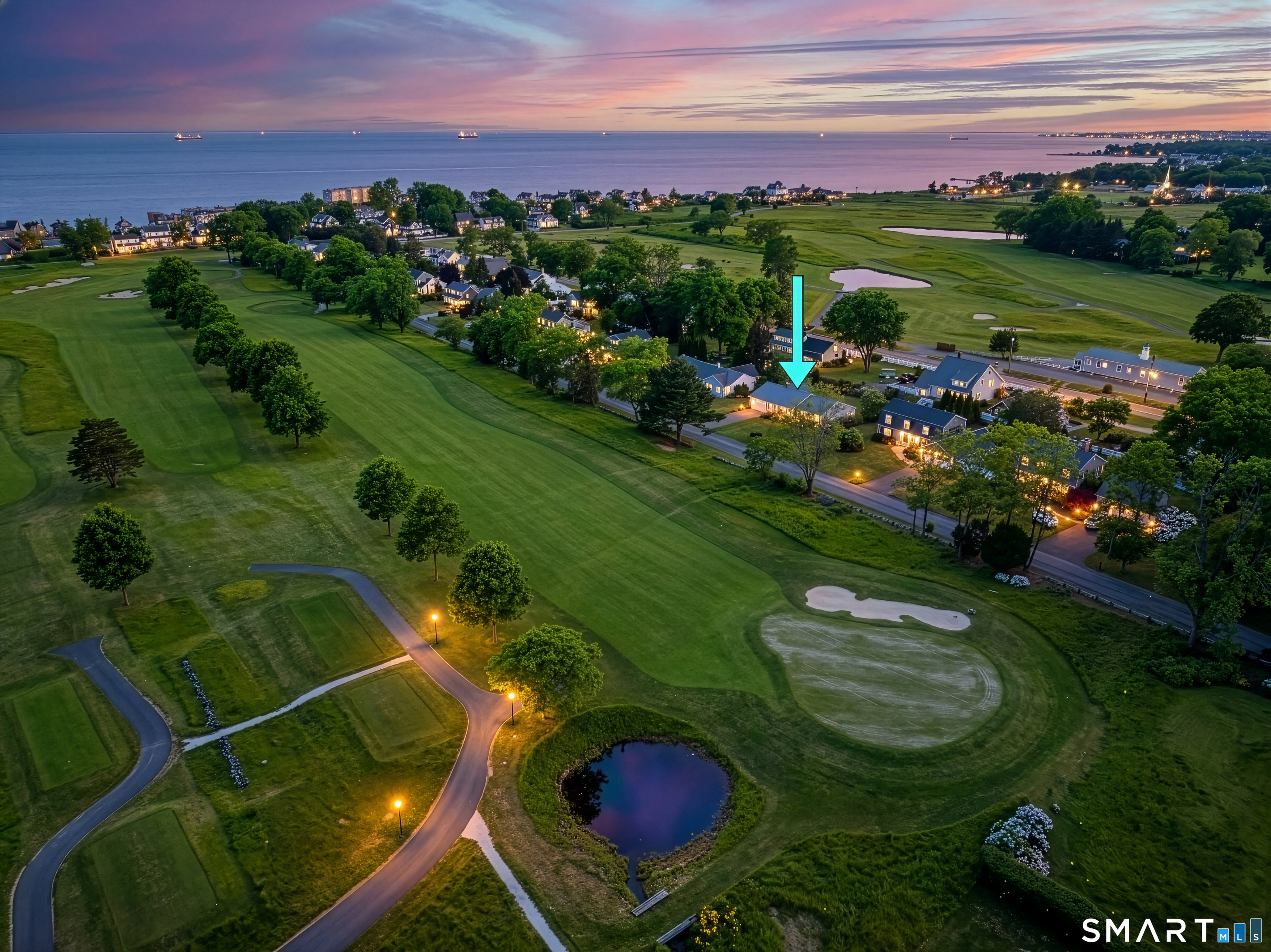 24 Cherry Lane Madison, CT 06443 - Photo 2 of 40 Twilight aerial photos of home. Golf course on either side and walk to West Wharf beach