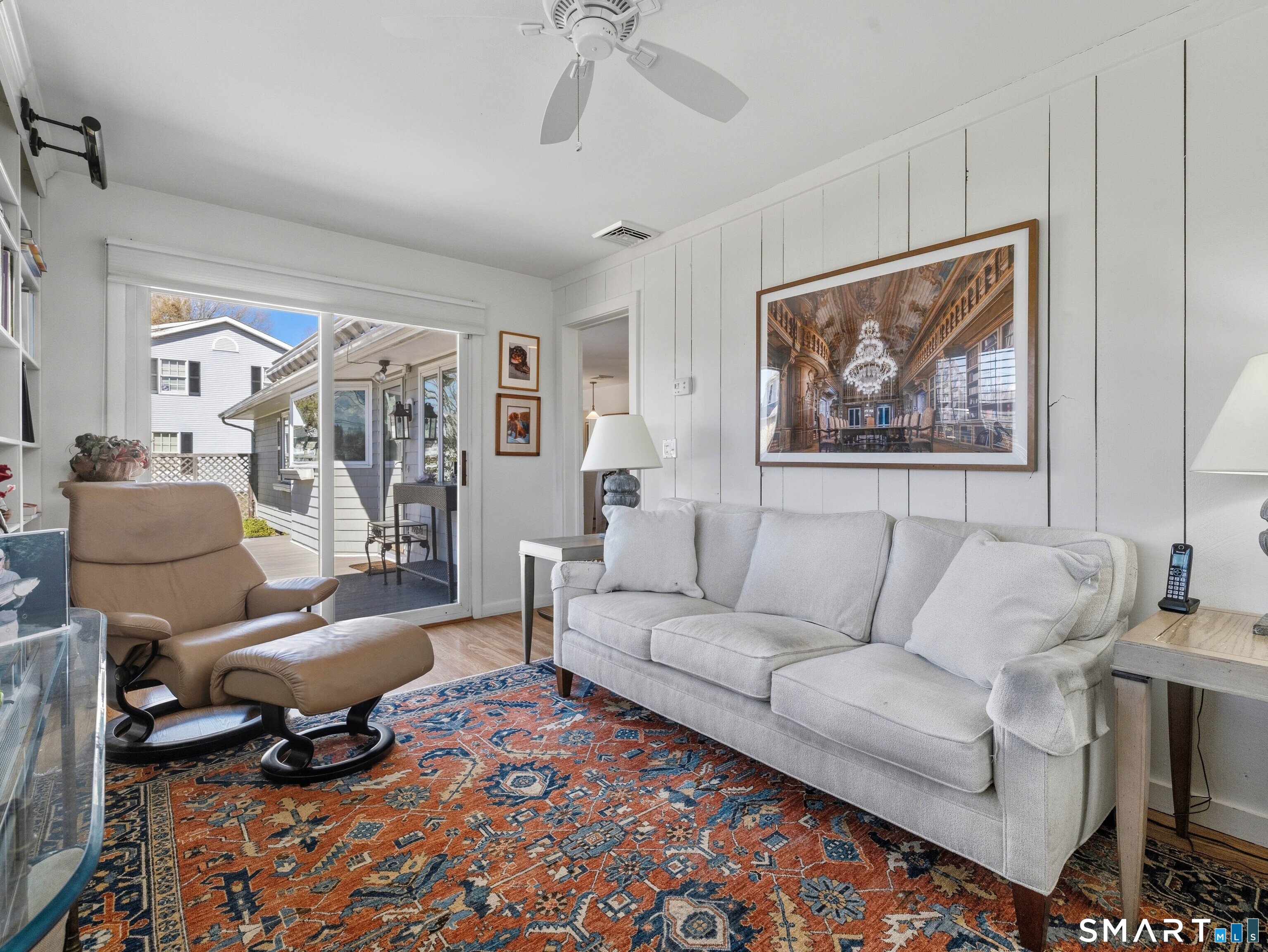 24 Cherry Lane Madison, CT 06443 - Photo 24 of 40 Family Room with sliders to trex deck