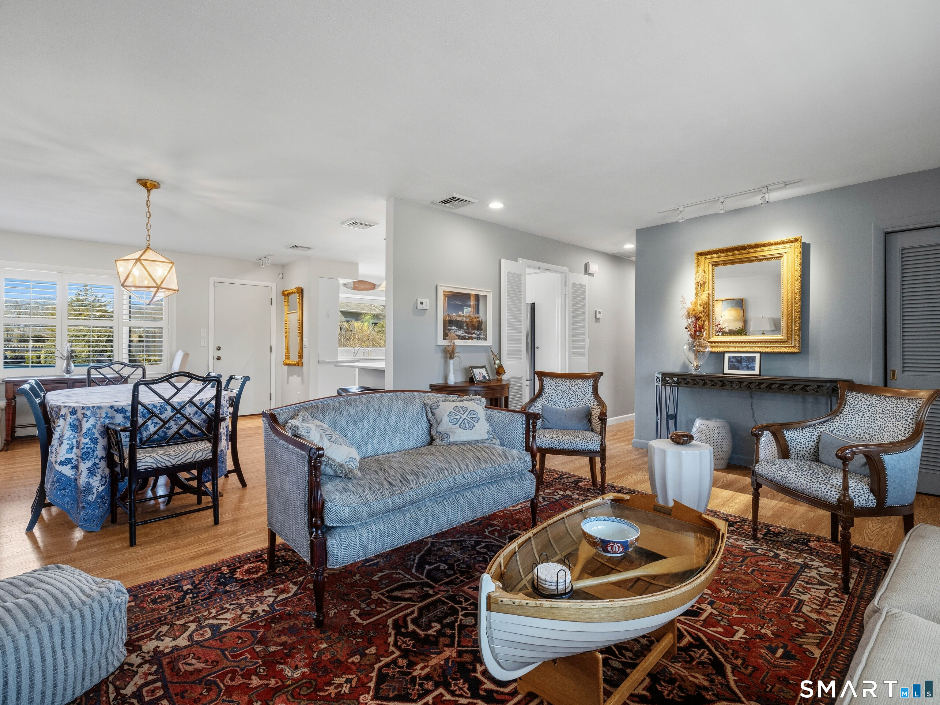 24 Cherry Lane Madison, CT 06443 - Photo 7 of 40 Living Room into Dining Room into Kitche