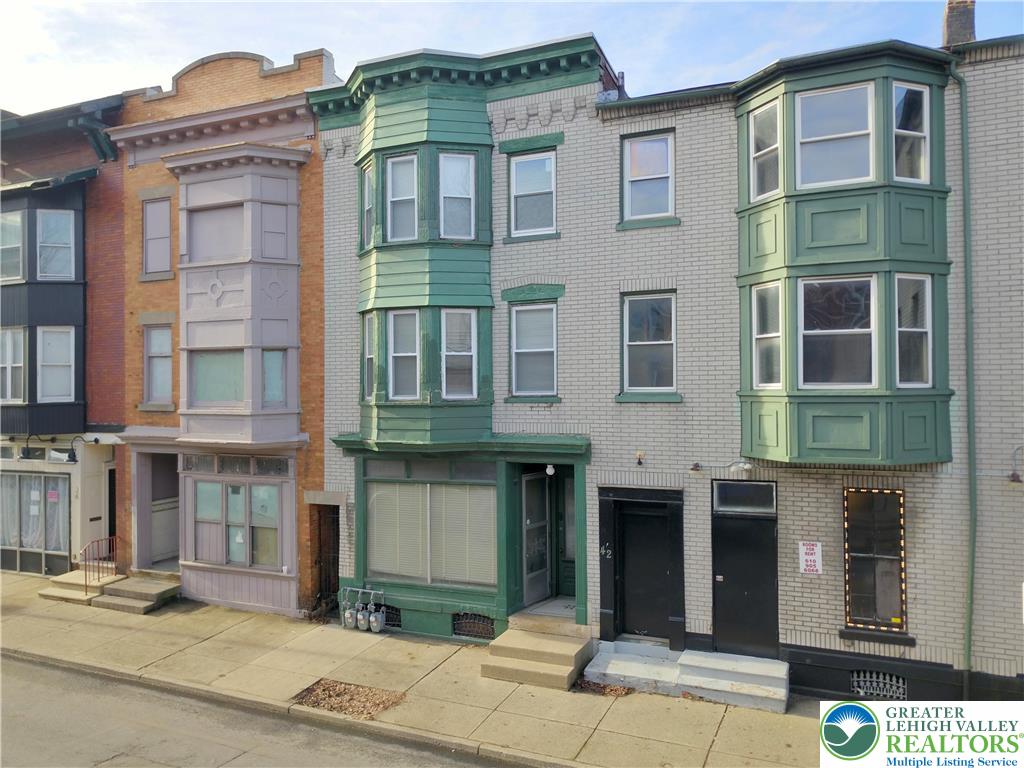 a front view of a multi story building