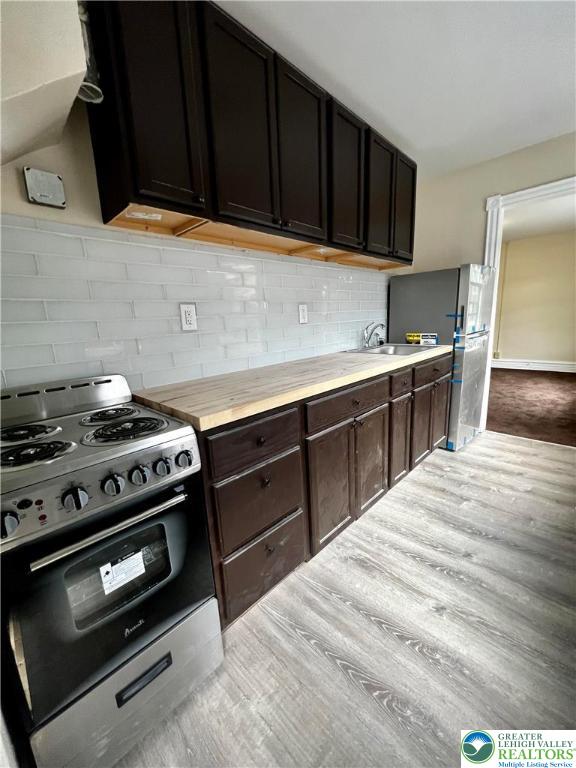 40 North 10th Street, Unit 3 Allentown, PA 18101 - Photo 7 of 19 a kitchen with a stove and a sink