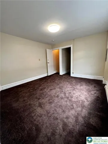 an empty room with closet