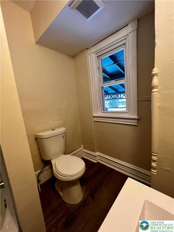 40 North 10th Street, Unit 3 Allentown, PA 18101 - Photo 10 of 19 a white toilet sitting next to a bathroom sink