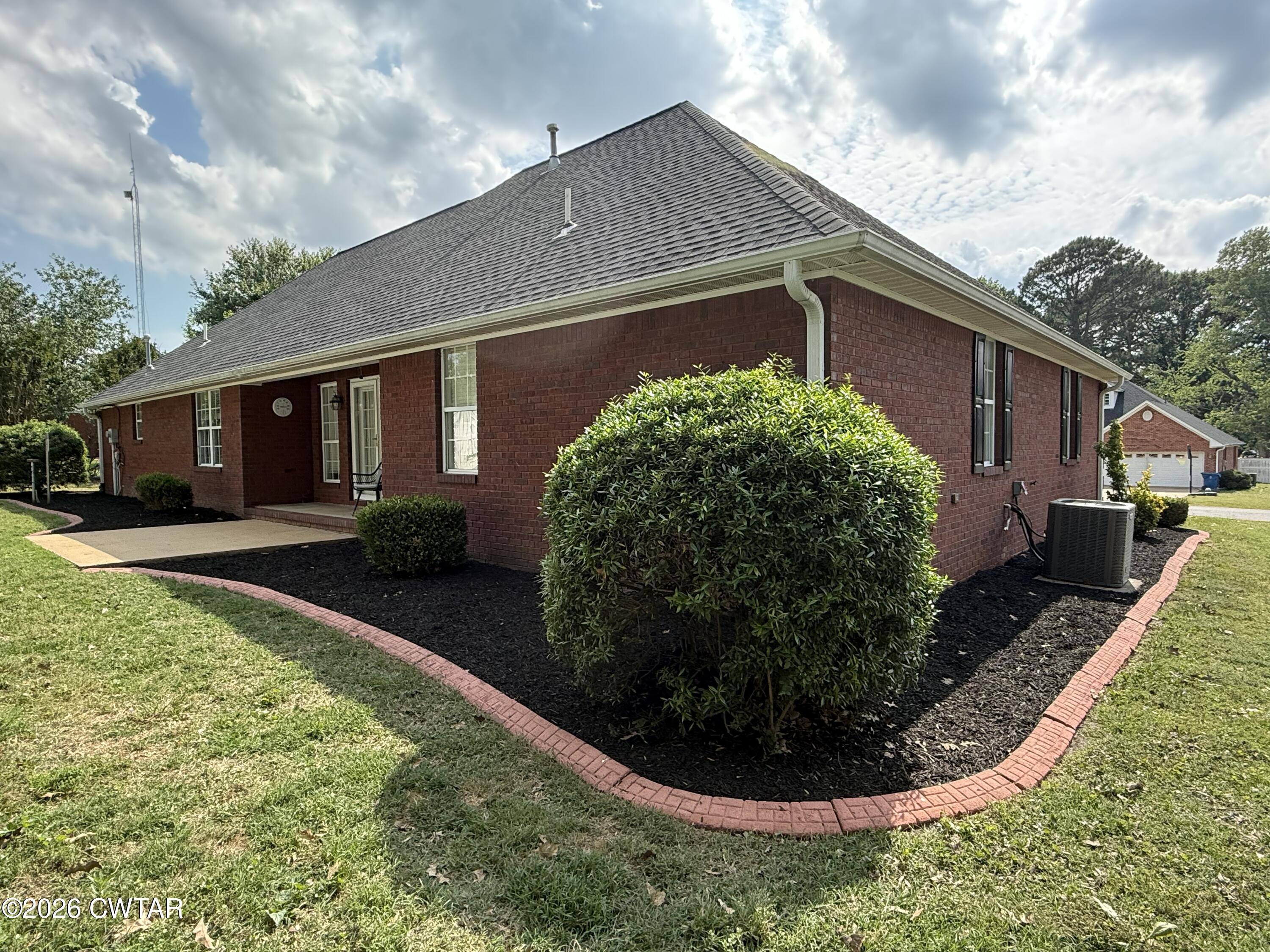 126 Waldunn Cove Rutherford, TN 38369 - Photo 17 of 18 a view of a house with backyard