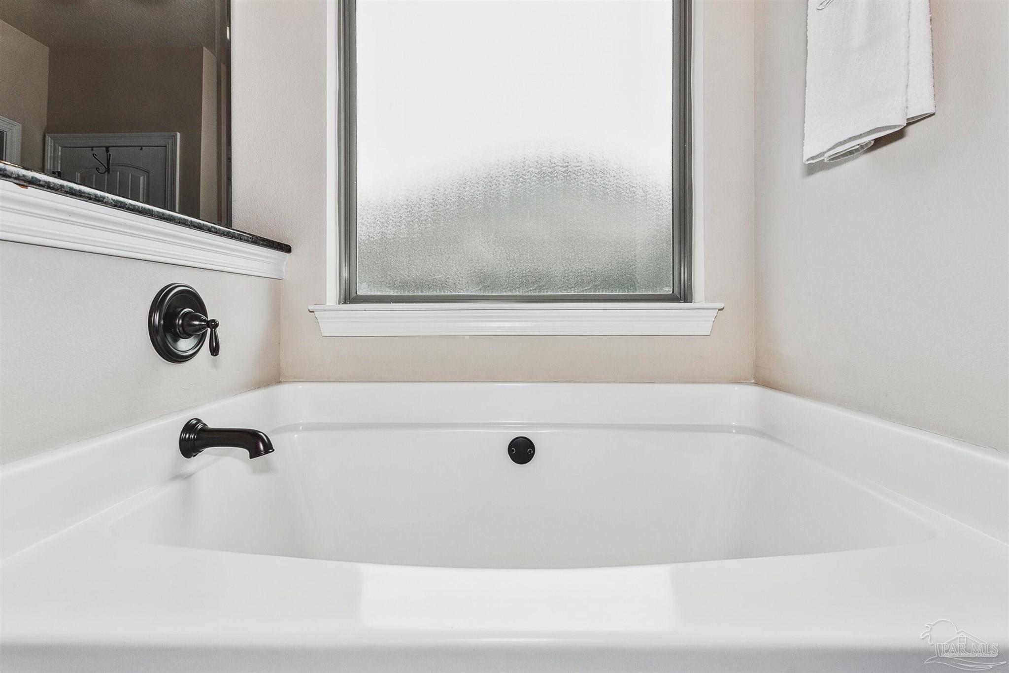 2072 Staff Drive Cantonment, FL 32533 - Photo 26 of 46 a bathroom with a bathtub