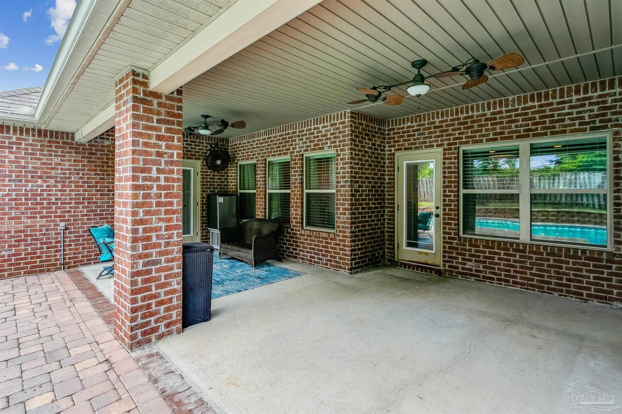 2072 Staff Drive Cantonment, FL 32533 - Photo 36 of 46 a view of a porch with wooden floor