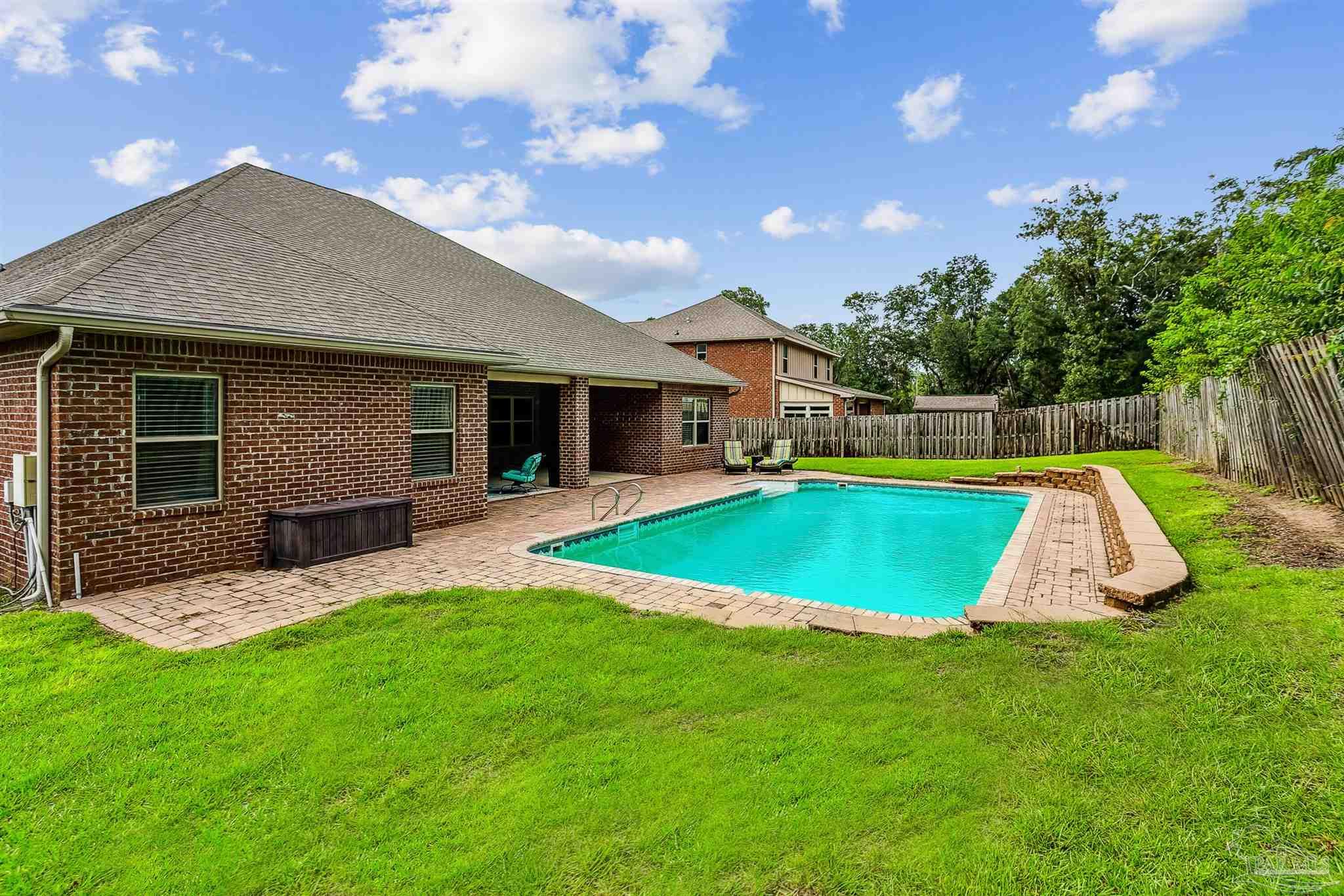 2072 Staff Drive Cantonment, FL 32533 - Photo 39 of 46 a view of a house with a backyard