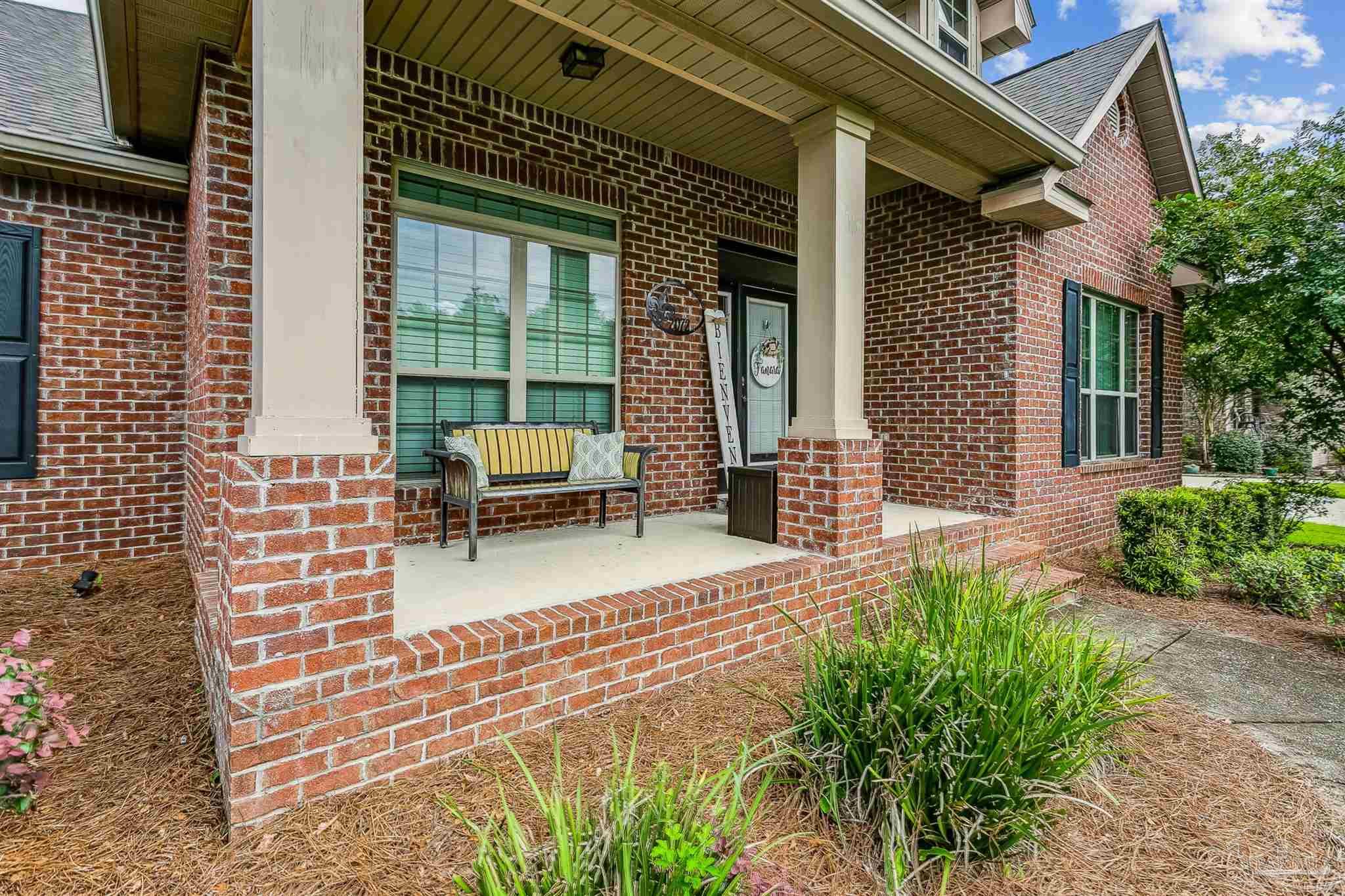 2072 Staff Drive Cantonment, FL 32533 - Photo 45 of 46 a building outdoor space with patio furniture