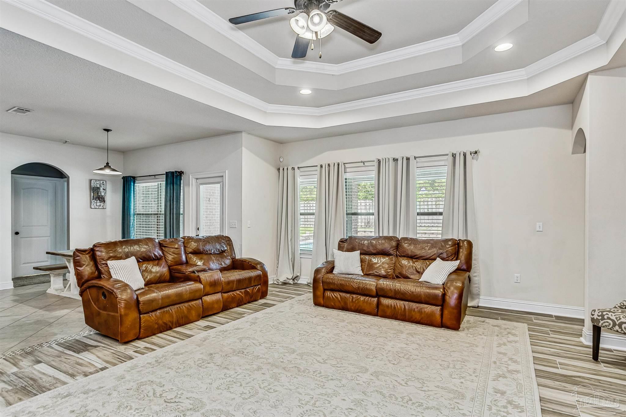 2072 Staff Drive Cantonment, FL 32533 - Photo 10 of 46 a living room with furniture and a large window