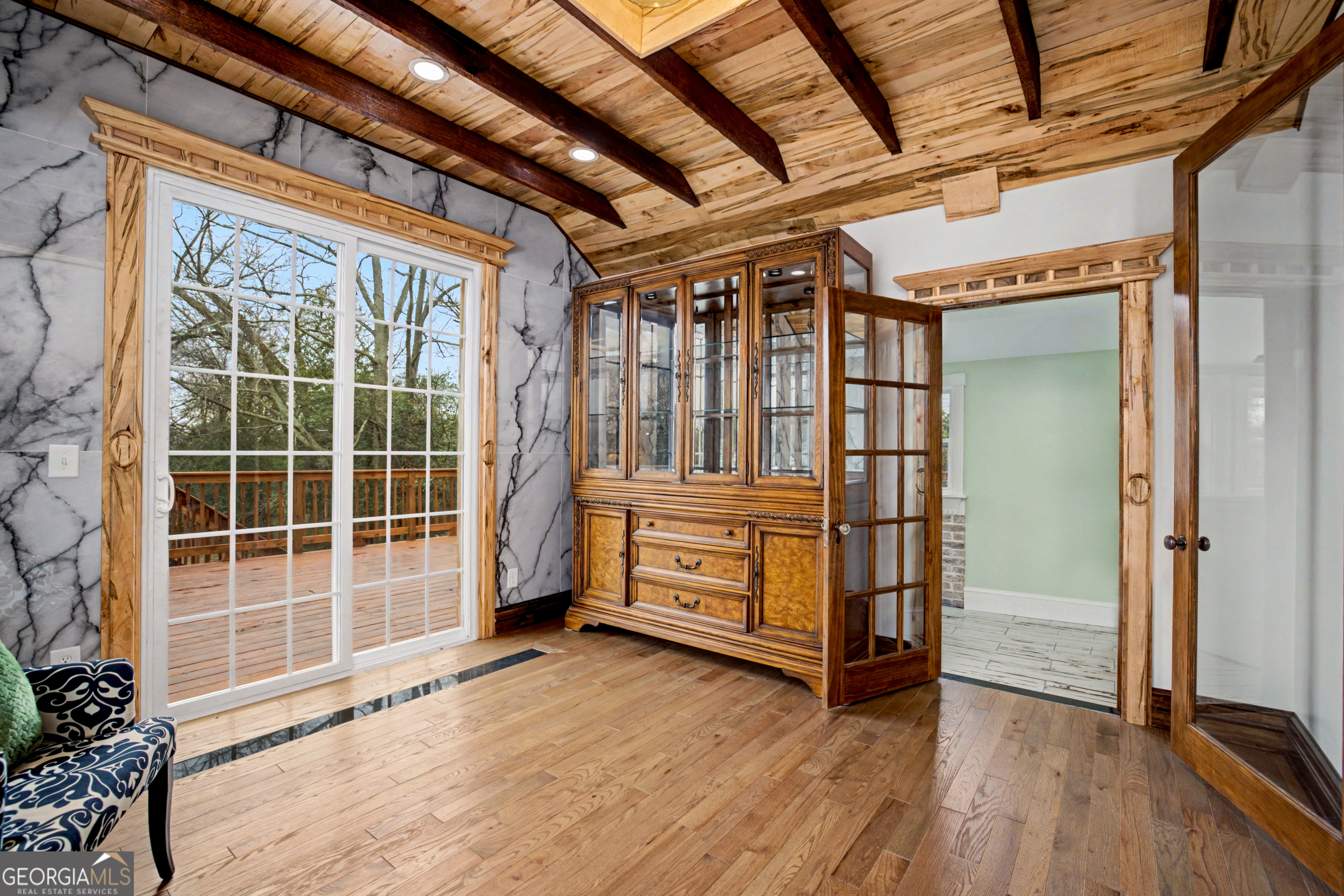 68 Spring Street Newnan, GA 30263 - Photo 23 of 48 an empty room with wooden floor and windows