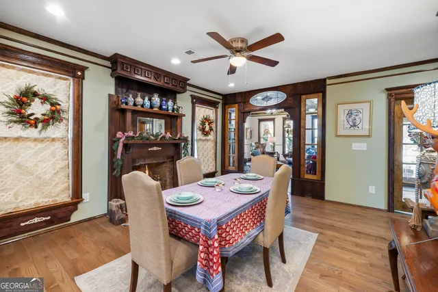 a kitchen with stainless steel appliances kitchen island granite countertop a refrigerator and a stove top oven