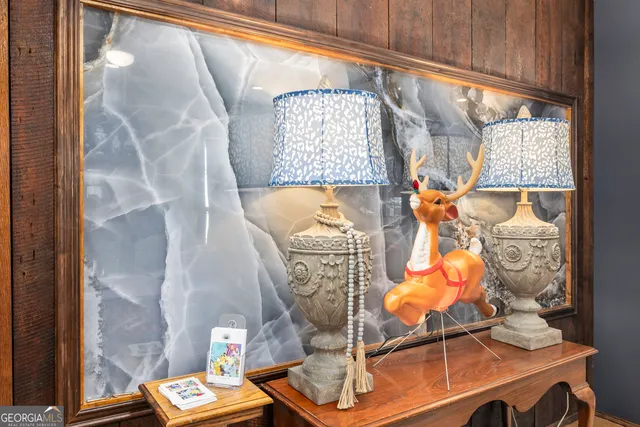 a kitchen with stainless steel appliances granite countertop a stove a sink dishwasher and cabinets with wooden floor