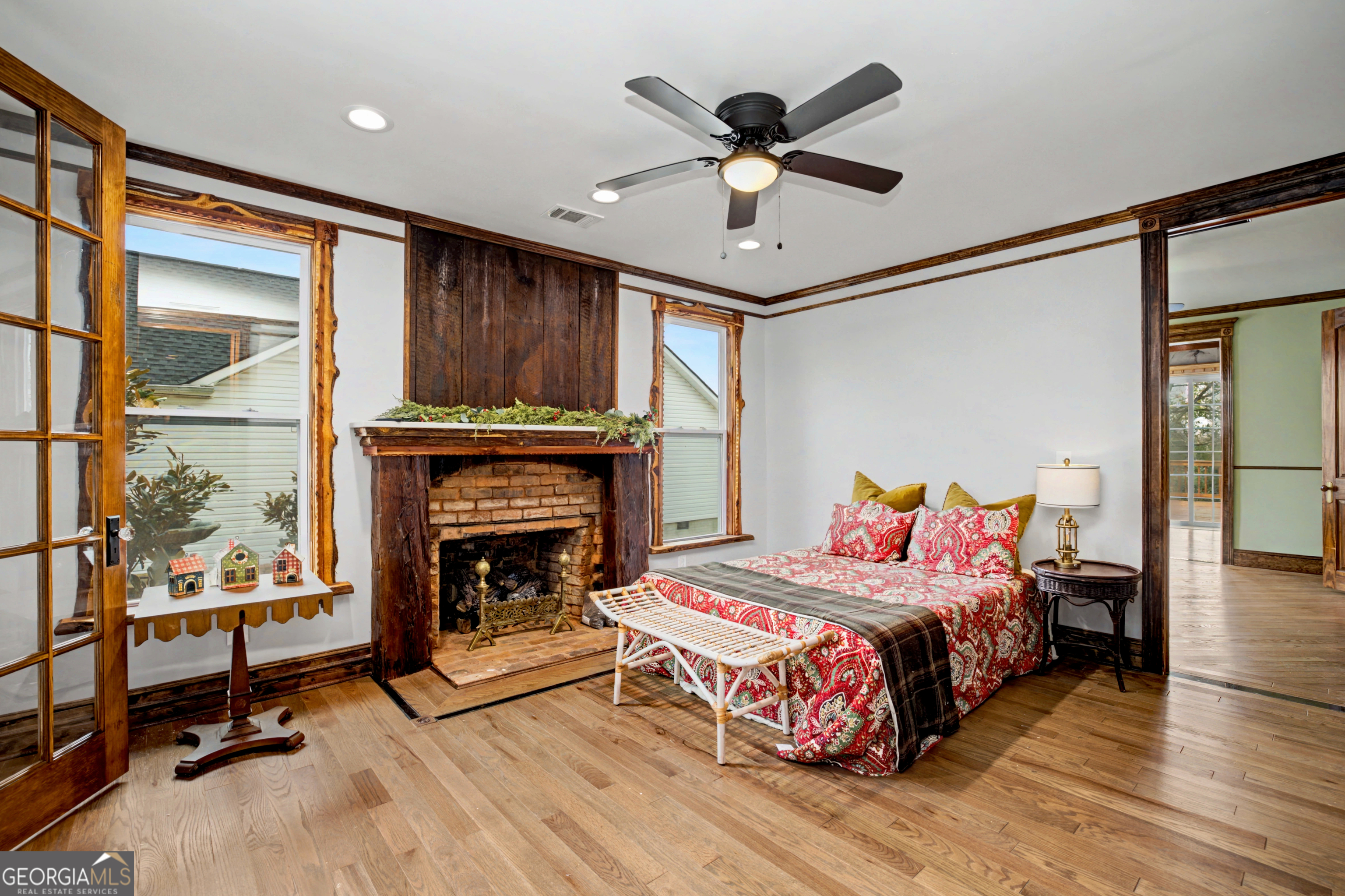 68 Spring Street Newnan, GA 30263 - Photo 30 of 48 a bedroom with a bed and a fireplace