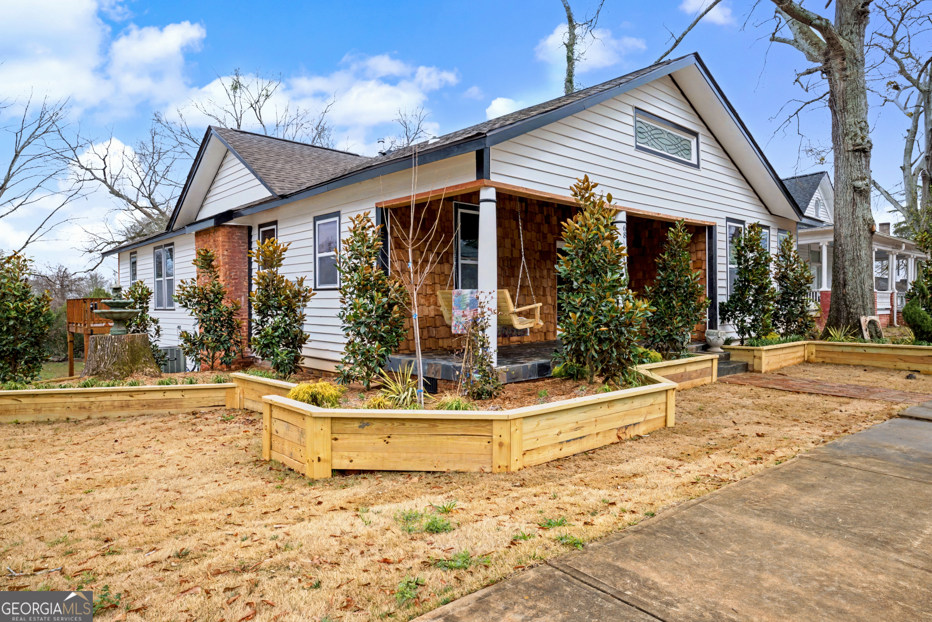 68 Spring Street Newnan, GA 30263 - Photo 3 of 48 a view of a house patio