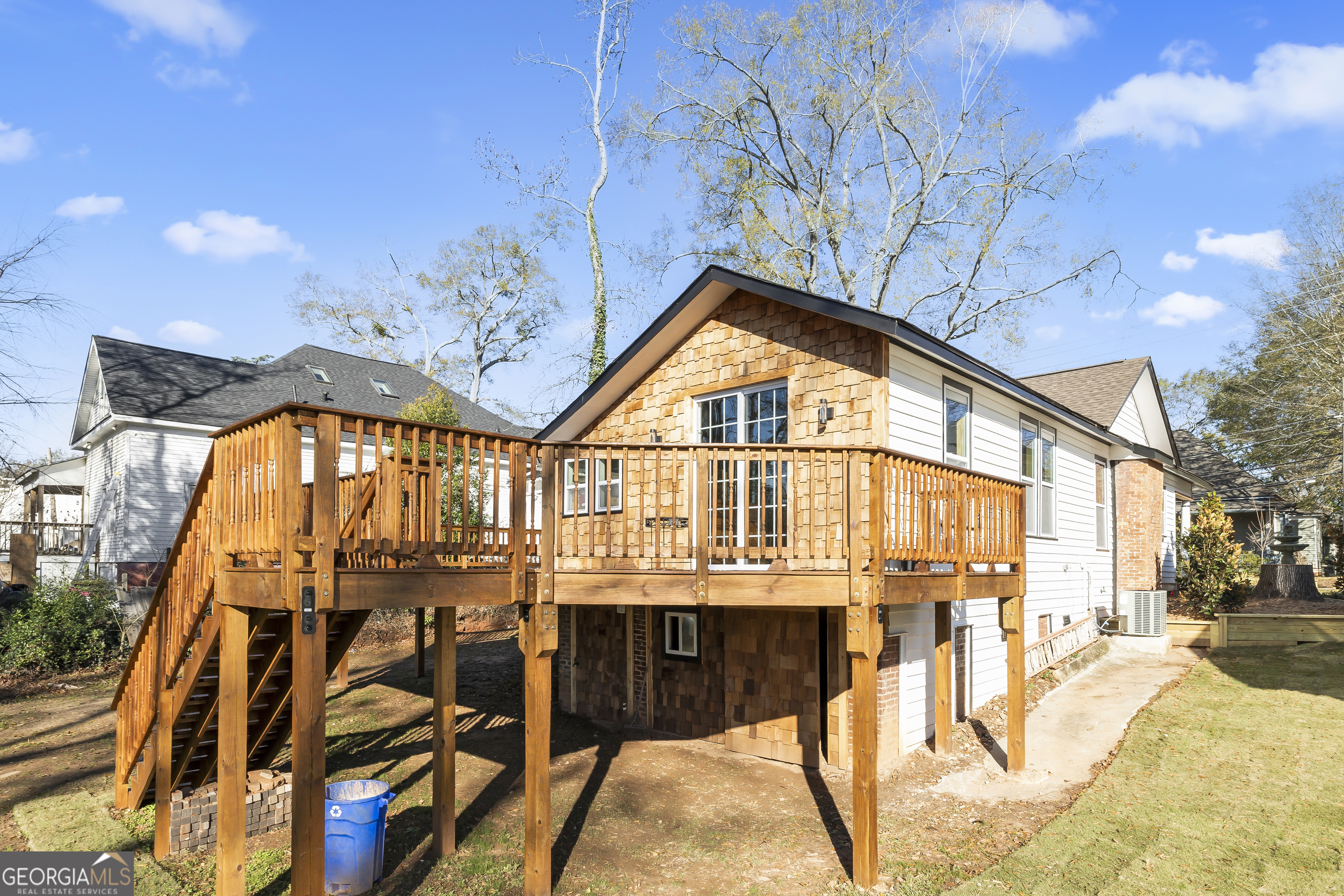 68 Spring Street Newnan, GA 30263 - Photo 34 of 48 a view of a house with a swimming pool