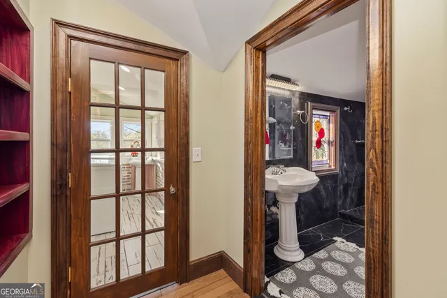 a view of an empty room with a window