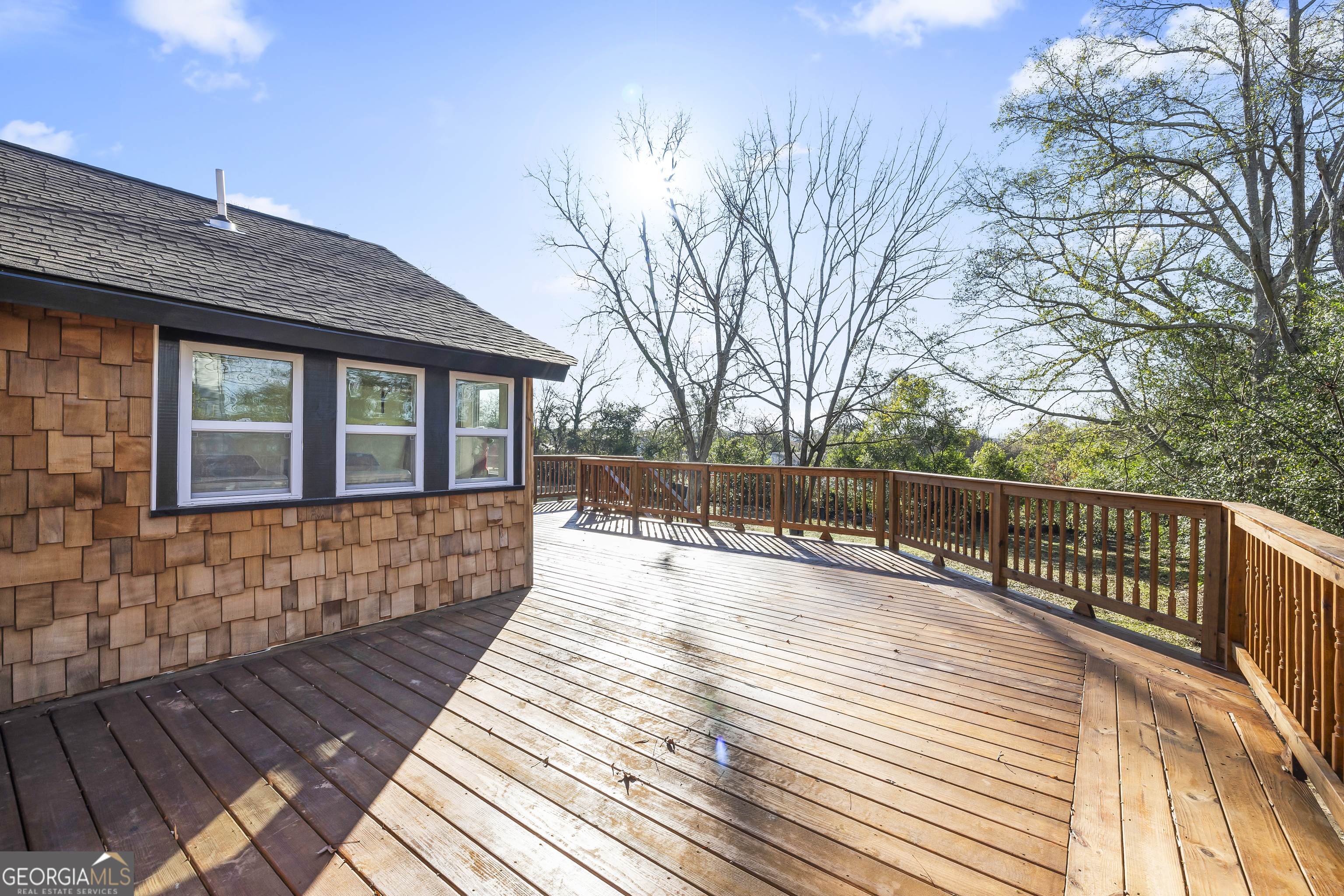 68 Spring Street Newnan, GA 30263 - Photo 40 of 48 a balcony with wooden floor