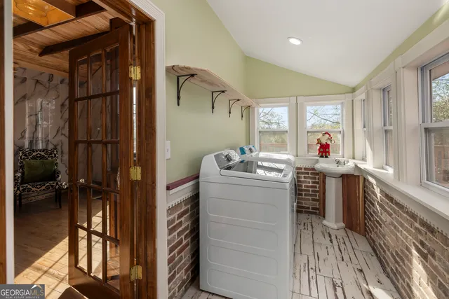 a bedroom with a bed and a fireplace