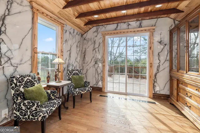 a bedroom with a bed and a fireplace