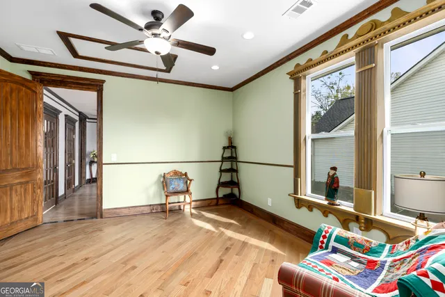 a bedroom with a bed and a fireplace