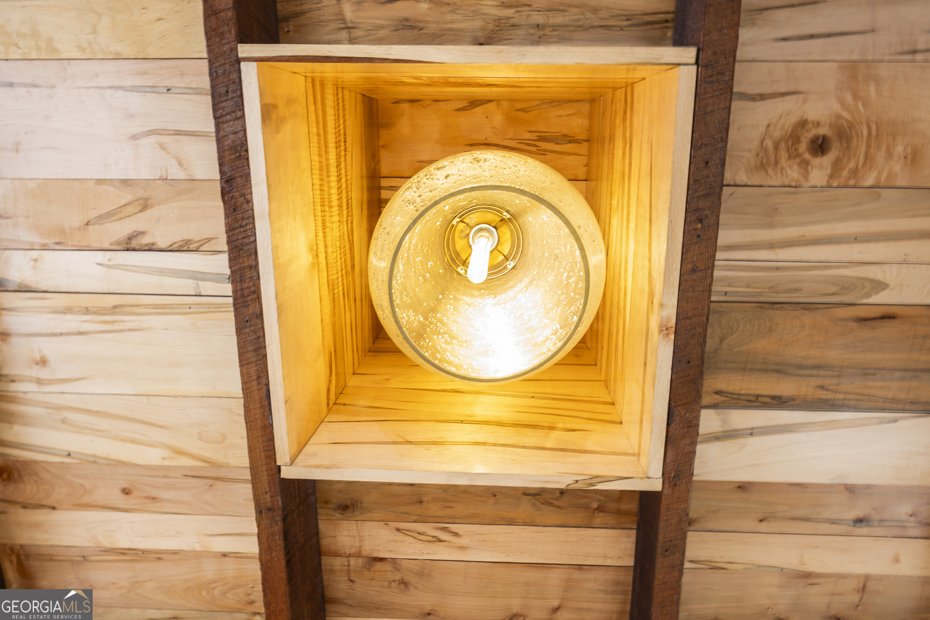 68 Spring Street Newnan, GA 30263 - Photo 45 of 48 a bathroom with a sink and a mirror