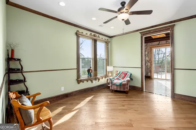 a bathroom with a bathtub sink and mirror