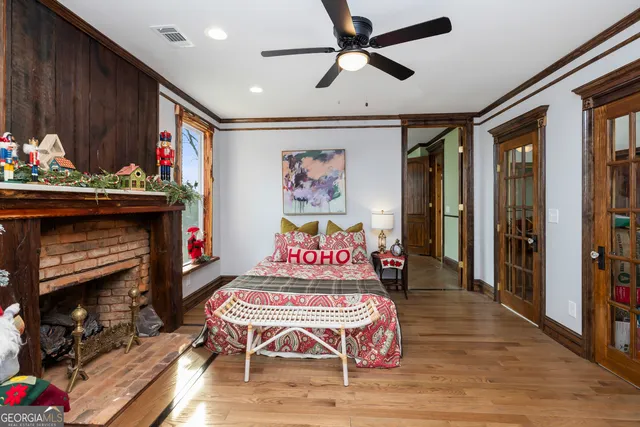 a view of swimming pool with a sitting area