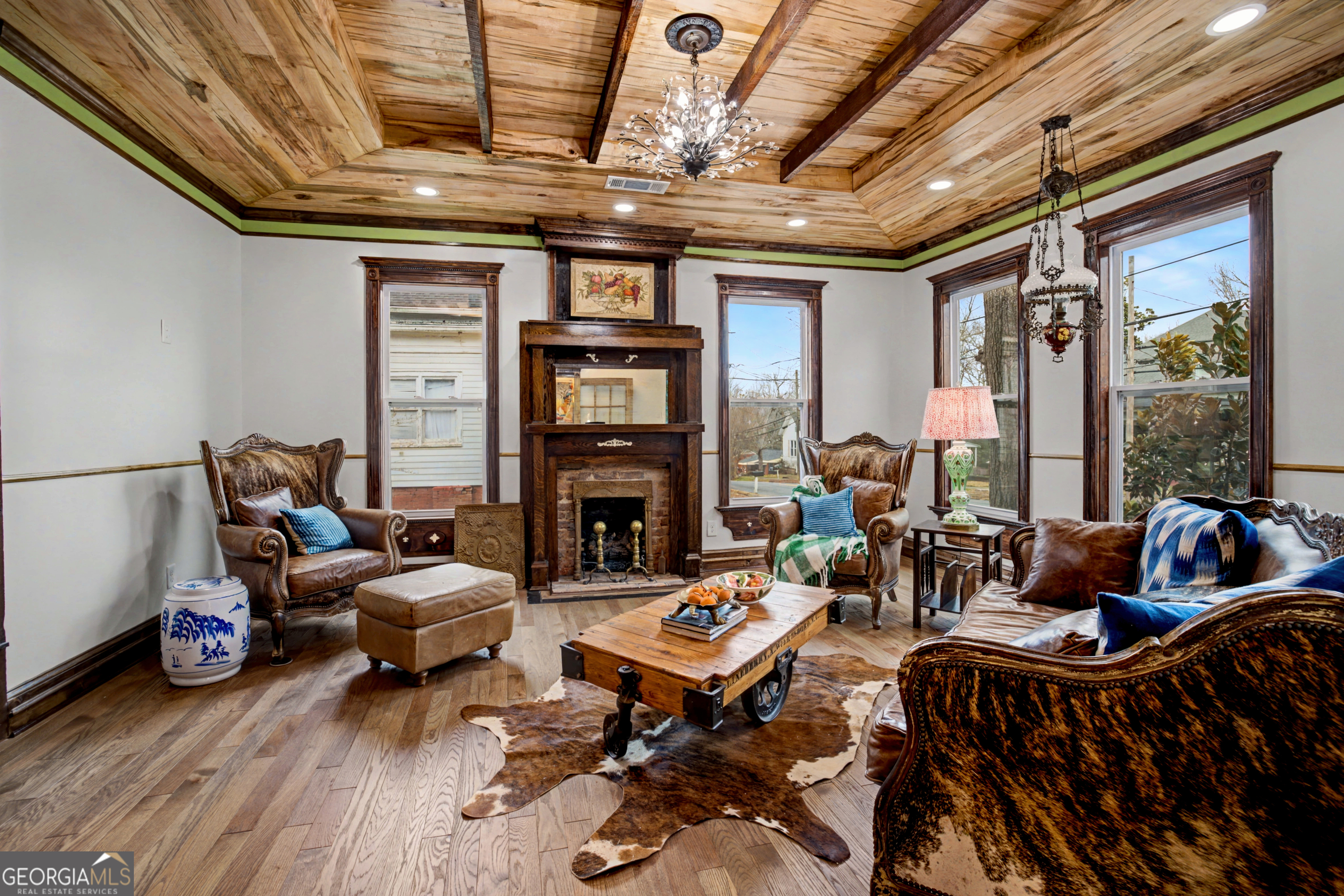 68 Spring Street Newnan, GA 30263 - Photo 8 of 48 a living room with furniture fireplace and flat screen tv