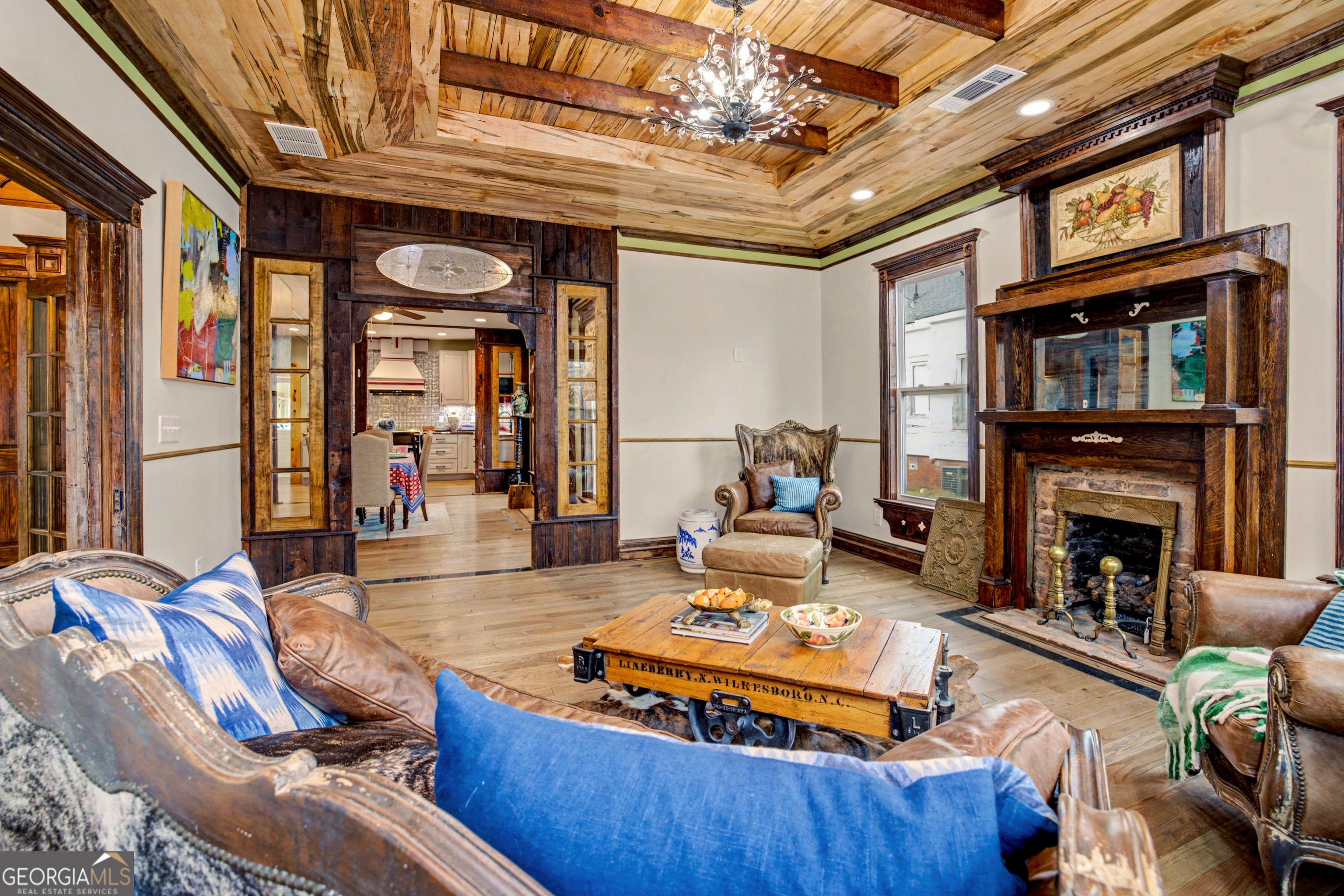 68 Spring Street Newnan, GA 30263 - Photo 10 of 48 a living room with furniture and a fireplace