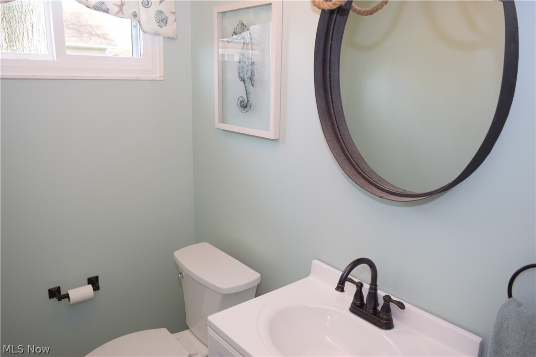 754 Grayton Road Berea, OH 44017 - Photo 8 of 20 Half Bath in the lower level off of the family room, renovated in 2020.