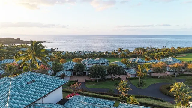 an aerial view of a houses with outdoor space