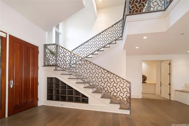 a view of entryway with wooden floor