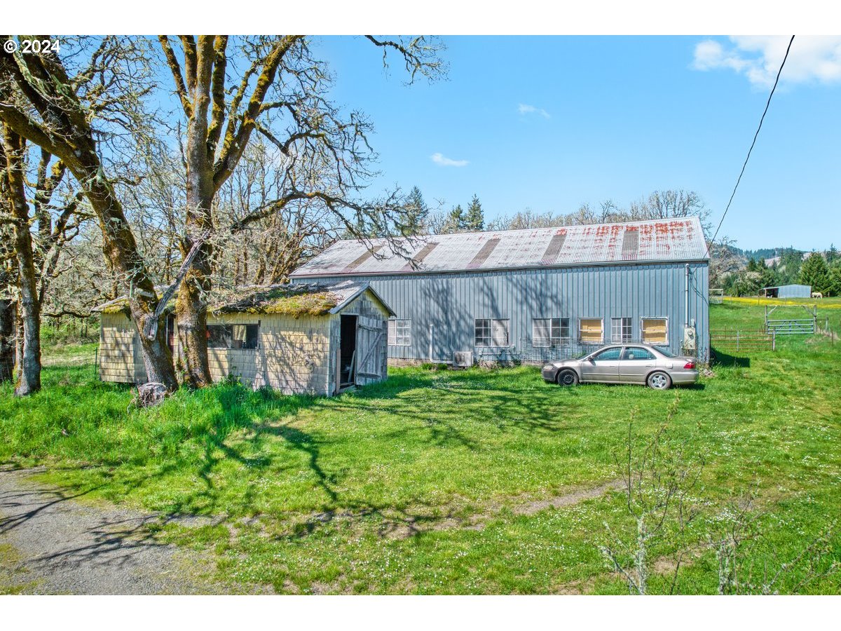 47700 Southwest Hebo Road Grand Ronde, OR 97347 - Photo 36 of 42 a view of a house with a yard and sitting area