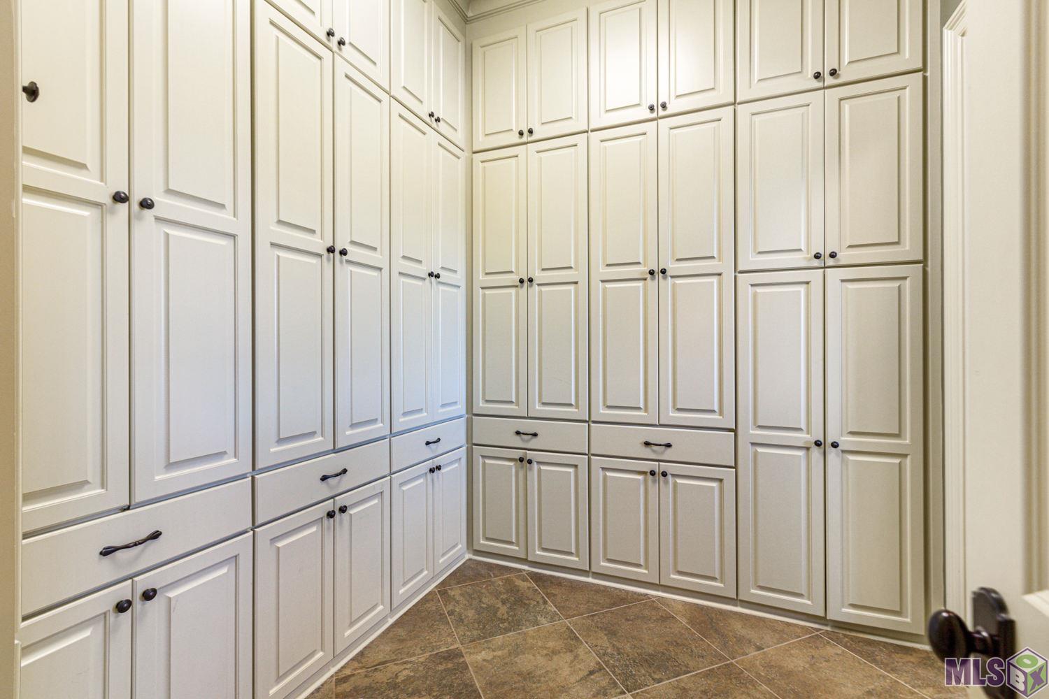 21808 Rabbit Run Drive Baton Rouge, LA 70817 - Photo 21 of 50 Additional Storage in Walk-In Utility Room