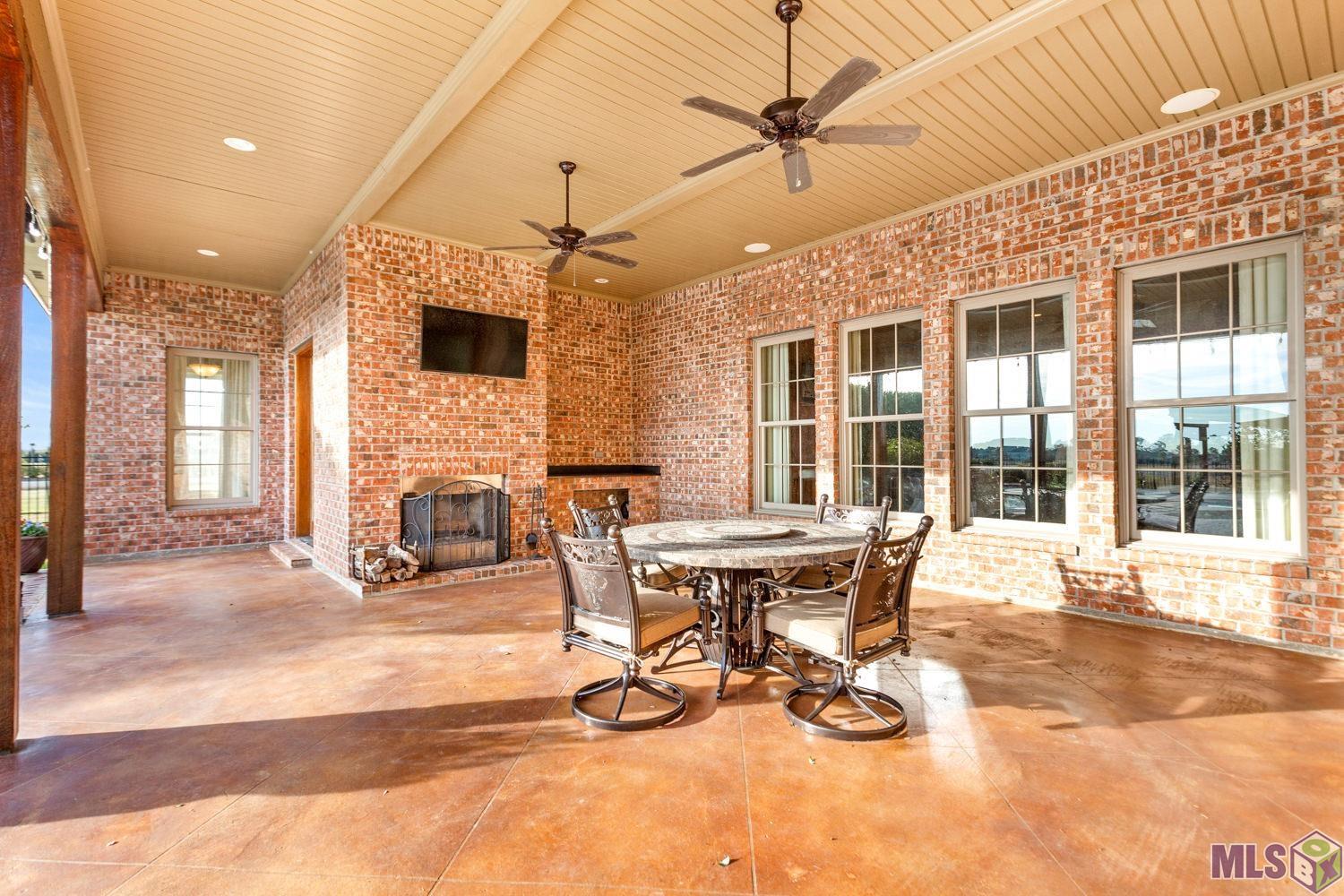 21808 Rabbit Run Drive Baton Rouge, LA 70817 - Photo 7 of 50 Outdoor Fireplace & Covered Entertainment Area