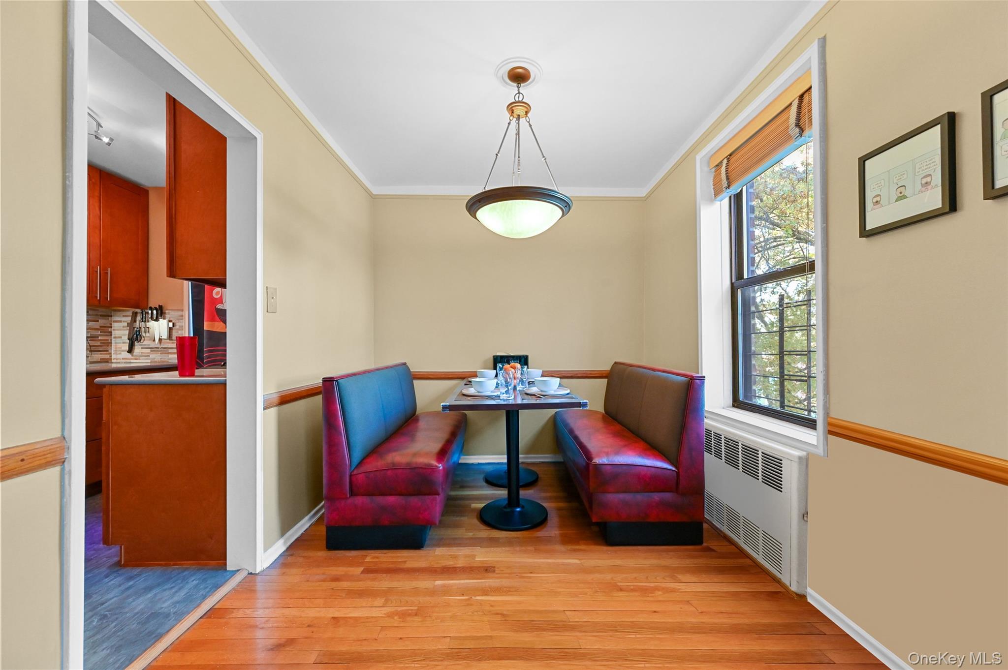80-35 Springfield Boulevard, Unit 4F Queens, NY 11427 - Photo 5 of 24 Sitting room featuring radiator, light wood-type flooring, and ornamental molding