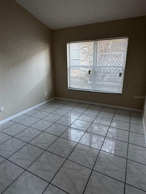 2702 Rochelle Drive Winter Haven, FL 33881 - Photo 11 of 11 a view of empty room with window