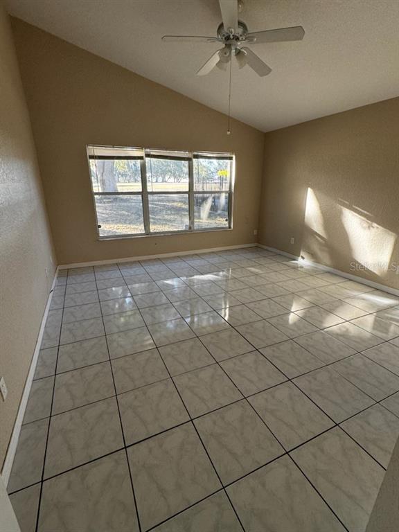 2702 Rochelle Drive Winter Haven, FL 33881 - Photo 7 of 11 a view of an empty room with a window