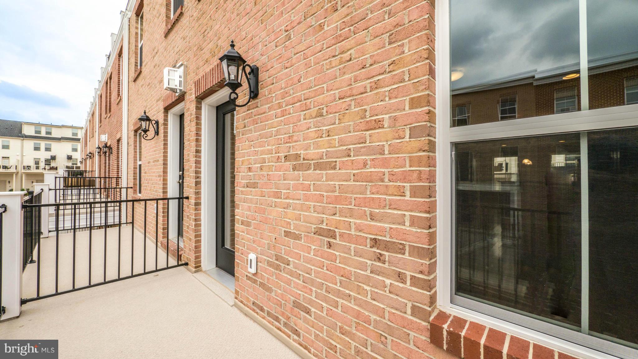 4628 Dillon Place Baltimore, MD 21224 - Photo 11 of 30 a view of a brick house with a street