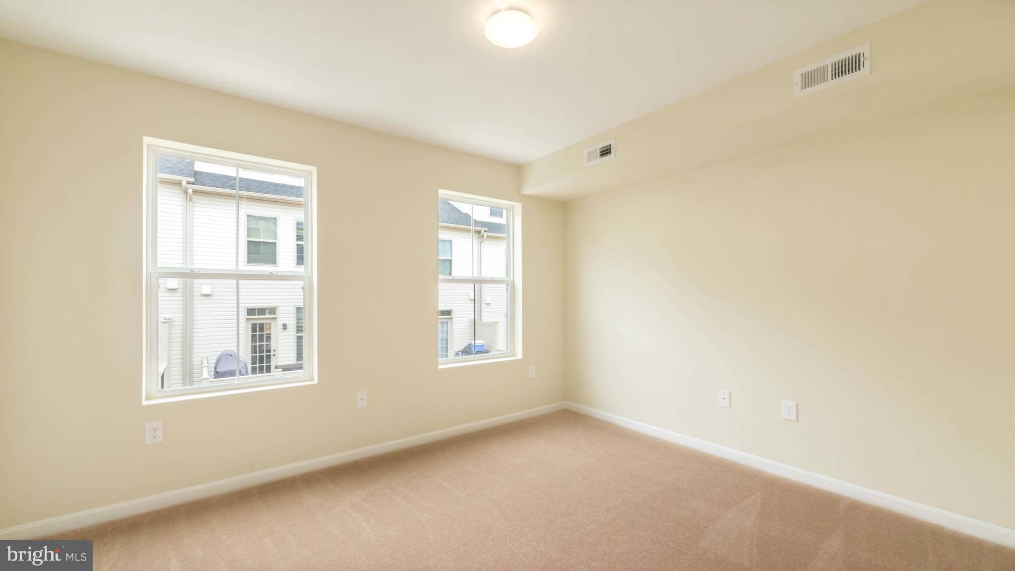 4628 Dillon Place Baltimore, MD 21224 - Photo 12 of 30 a view of an empty room with a window