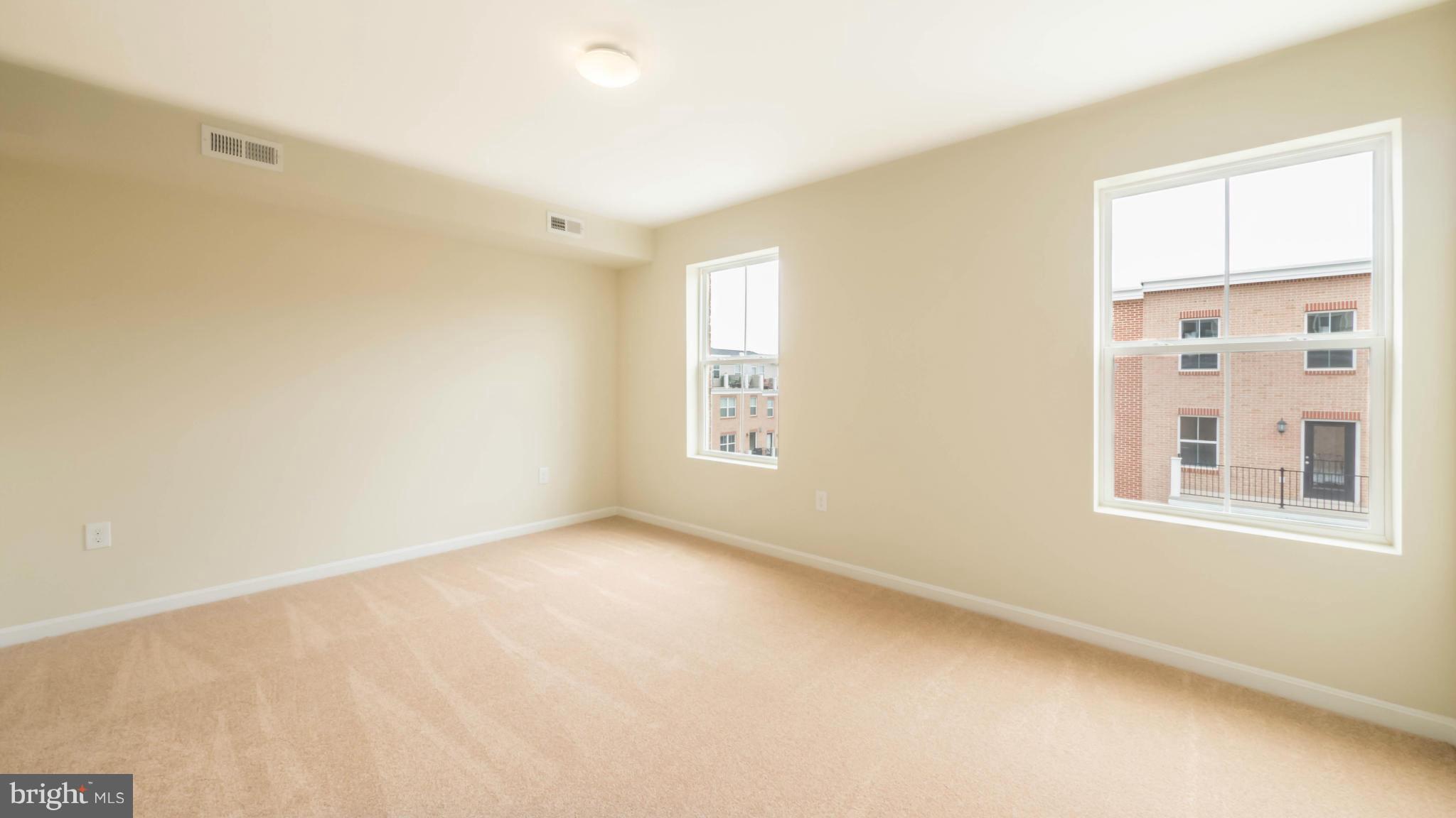 4628 Dillon Place Baltimore, MD 21224 - Photo 15 of 30 a view of an empty room with a window