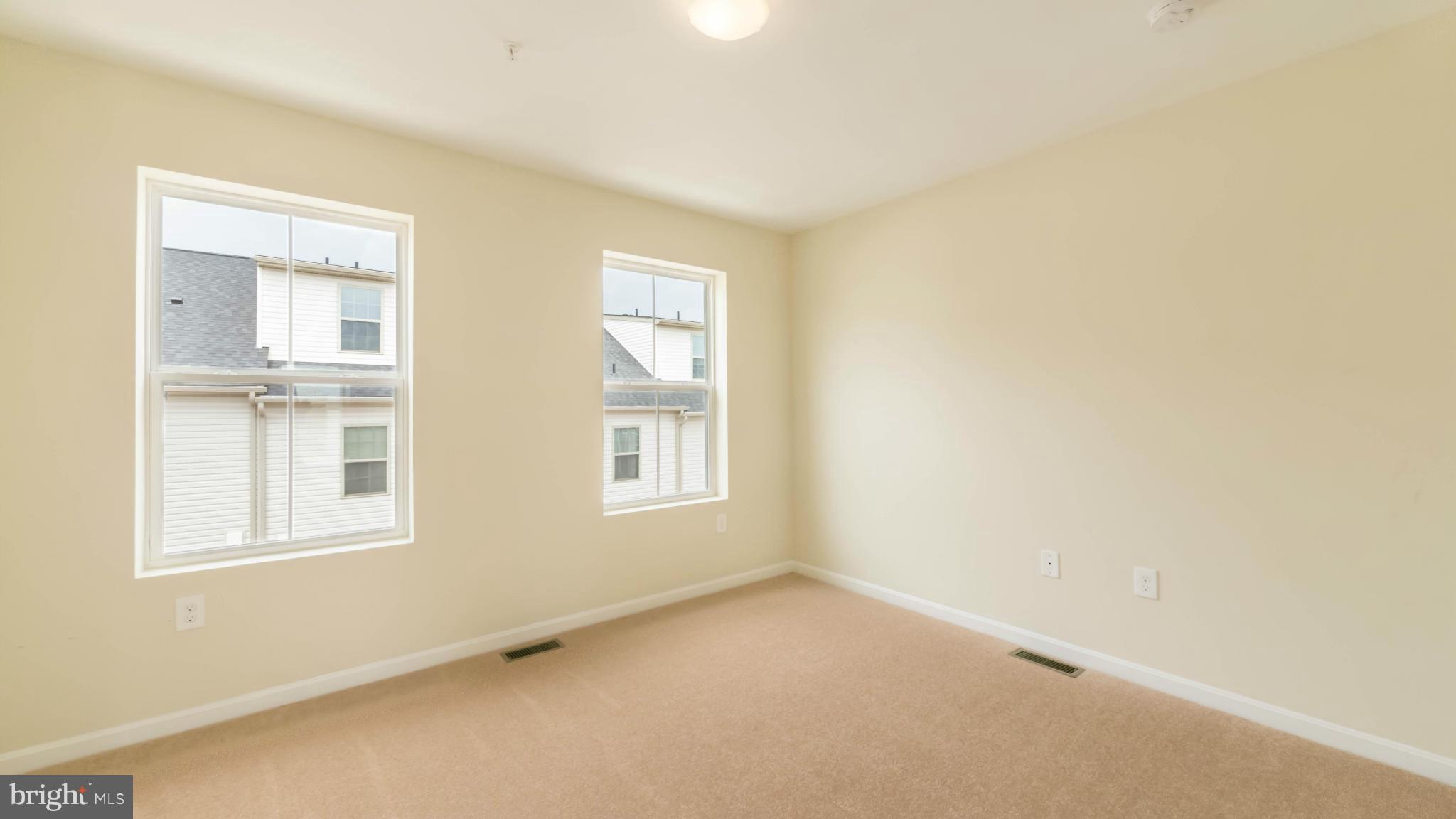 4628 Dillon Place Baltimore, MD 21224 - Photo 20 of 30 a view of an empty room with a window