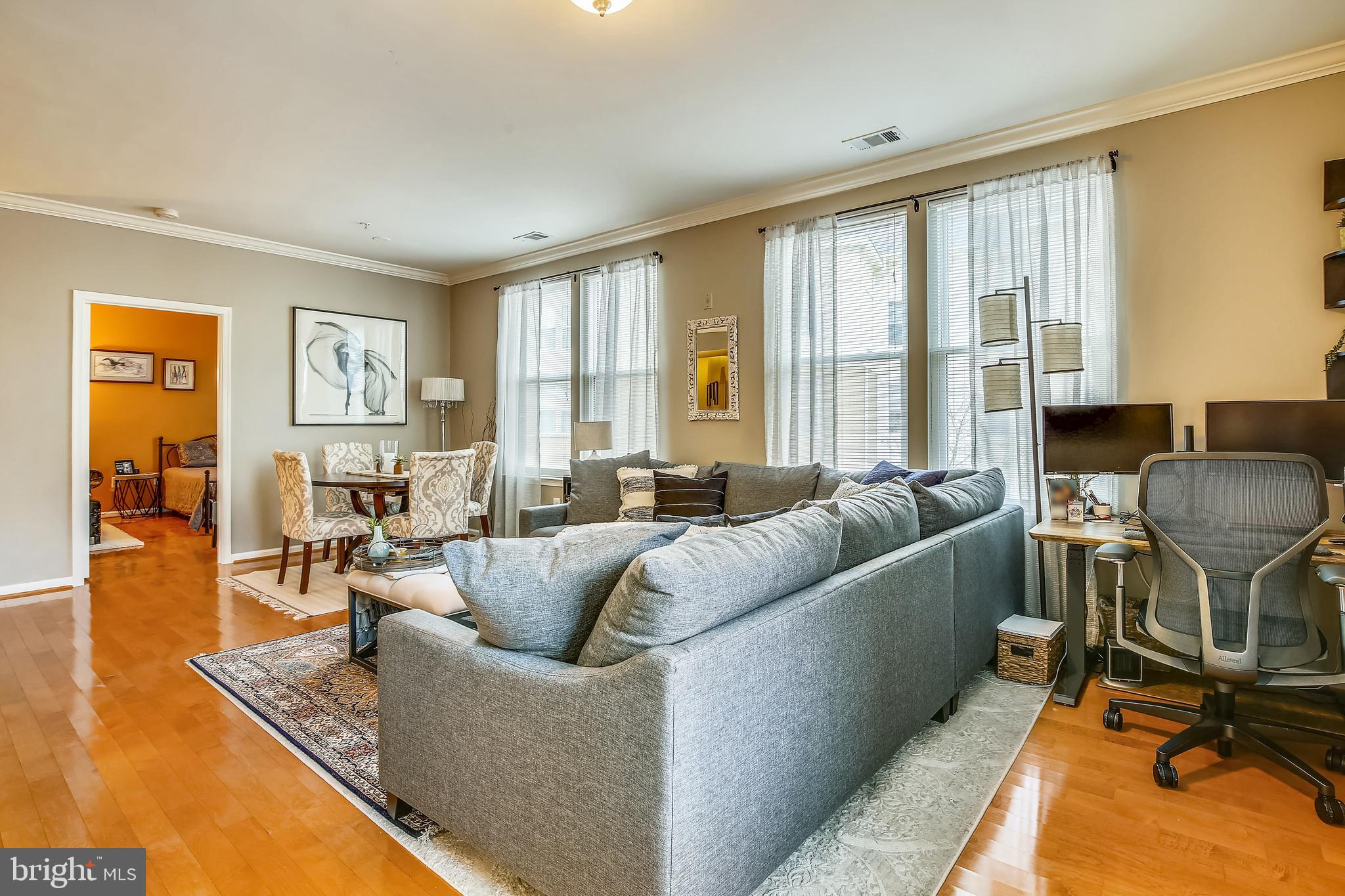 12001 Market Street, Unit 382 Reston, VA 20190 - Photo 16 of 74 Living Room/Dining Area