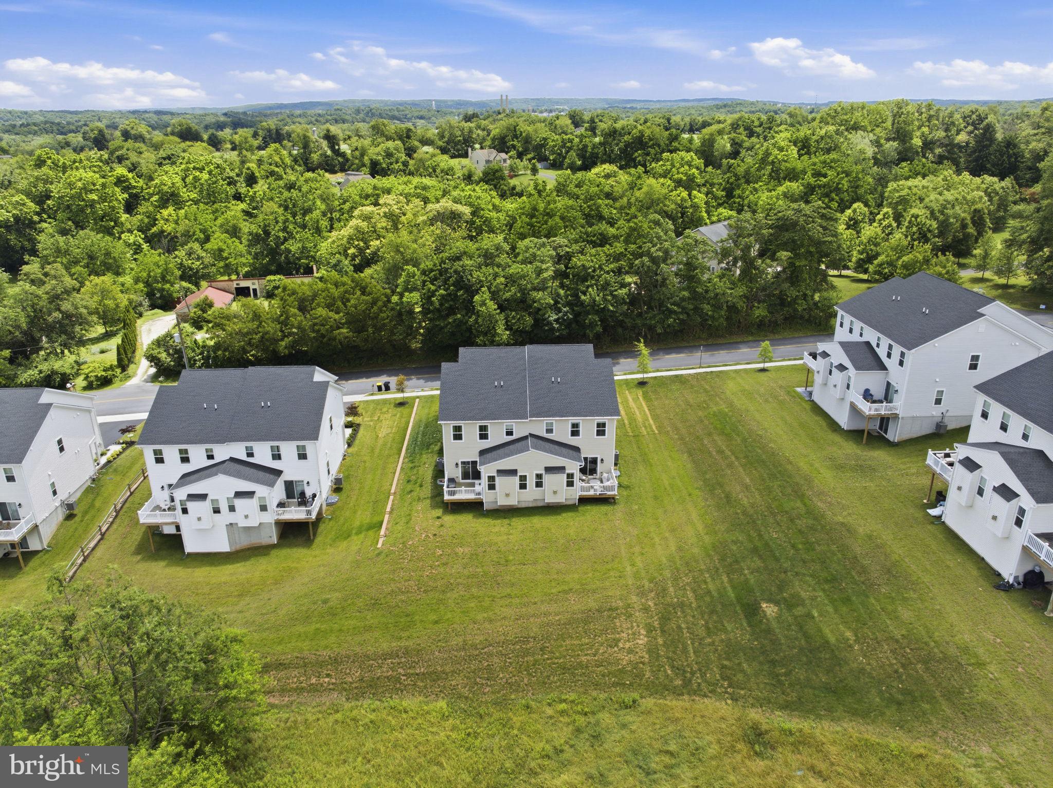727 Hunsberger Road Spring City, PA 19475 - Photo 54 of 56 Serene homes nestled in lush greenery.