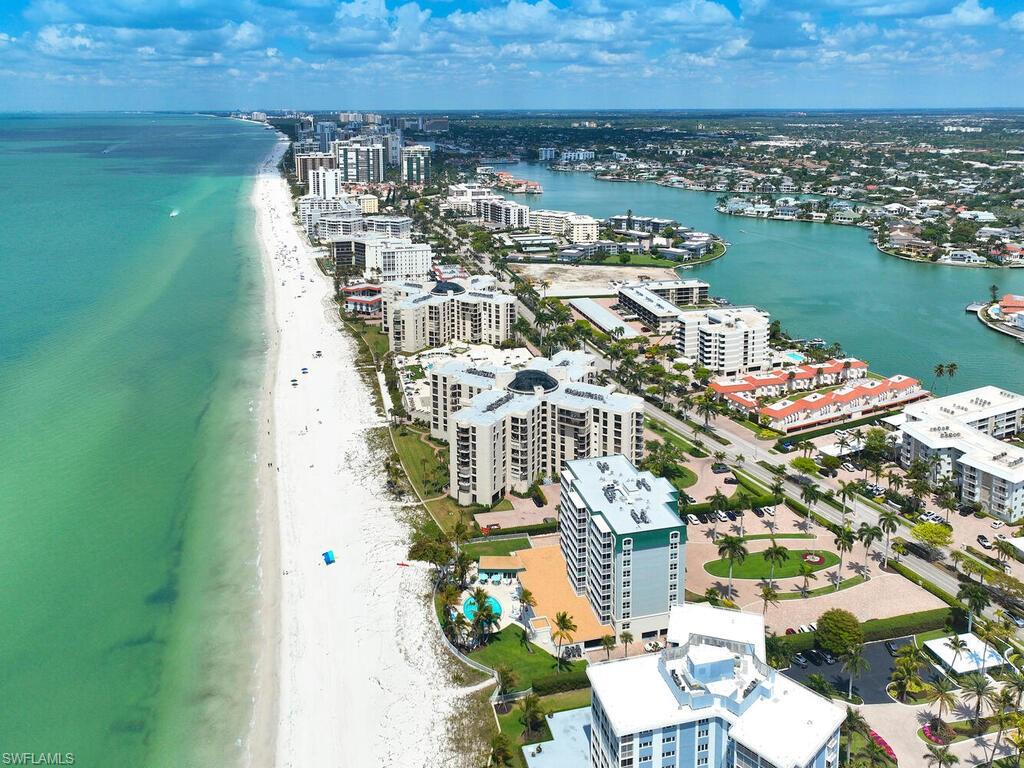 3003 Gulf Shore Boulevard North, Unit 604 Naples, FL 34103 - Photo 33 of 33 an aerial view of multiple house